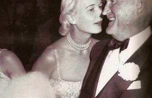 cz guest Passing on an amusing thought to socialite Chris Dunphy at the Polo Ball in Palm Beach in 1954.jpg